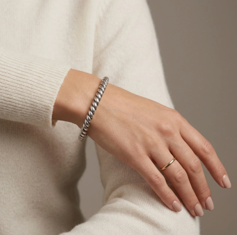 VINTAGE SILVER SORELLA TWIST BANGLE