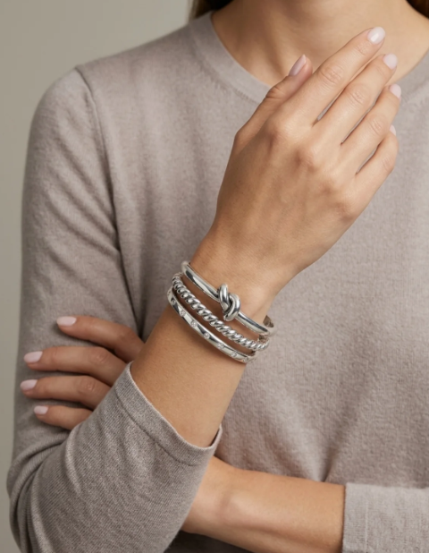 VINTAGE SILVER SORELLA TWIST BANGLE